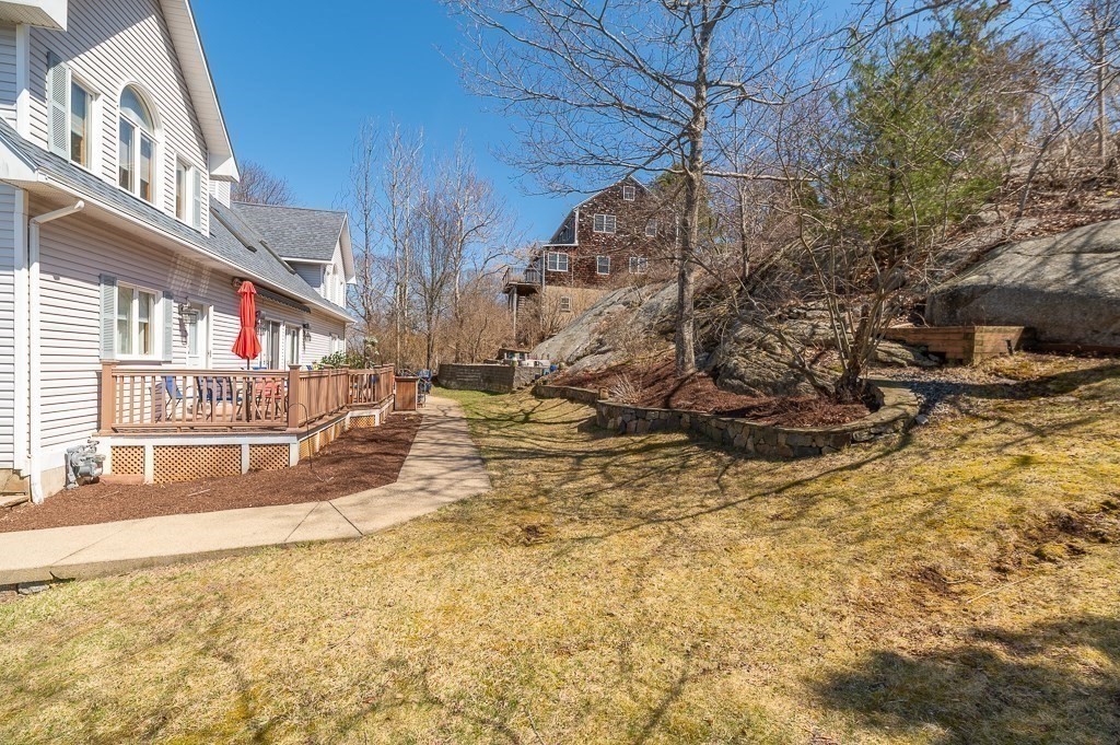 129 Thatcher Road Gloucester, MA 01930 - Photo 28 of 31 a view of a backyard of the house