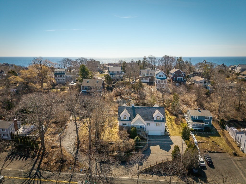 129 Thatcher Road Gloucester, MA 01930 - Photo 4 of 31 an aerial view of a city with lots of residential buildings