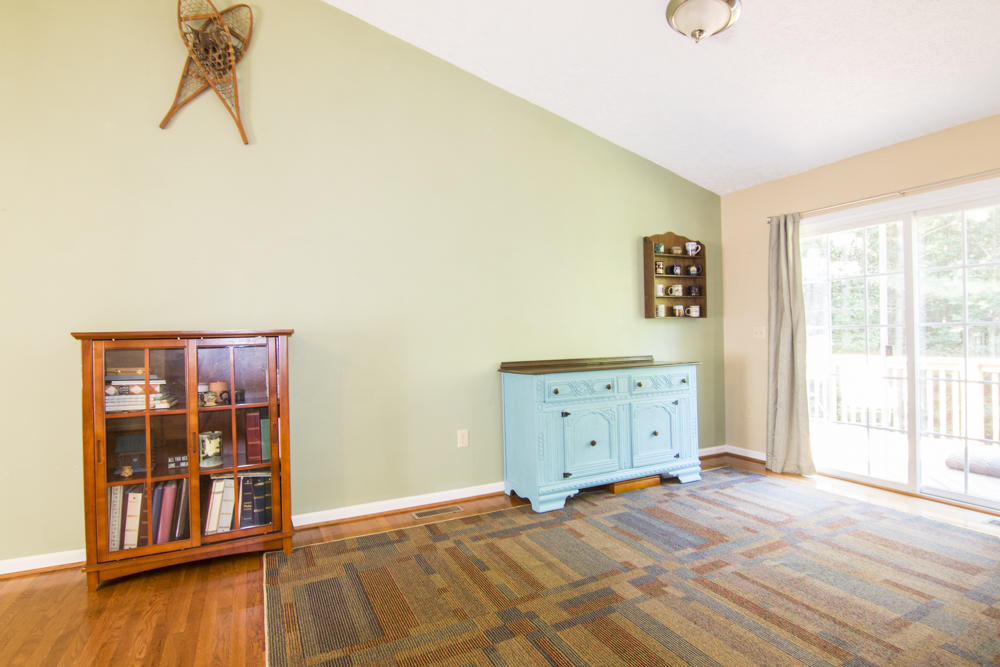 739 Holland Road Callaway, VA 24067 - Photo 22 of 42 a view of an empty room with window and wooden floor