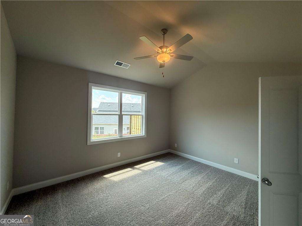 352 Lakeside Drive Canton, GA 30115 - Photo 9 of 16 a view of an empty room with a window