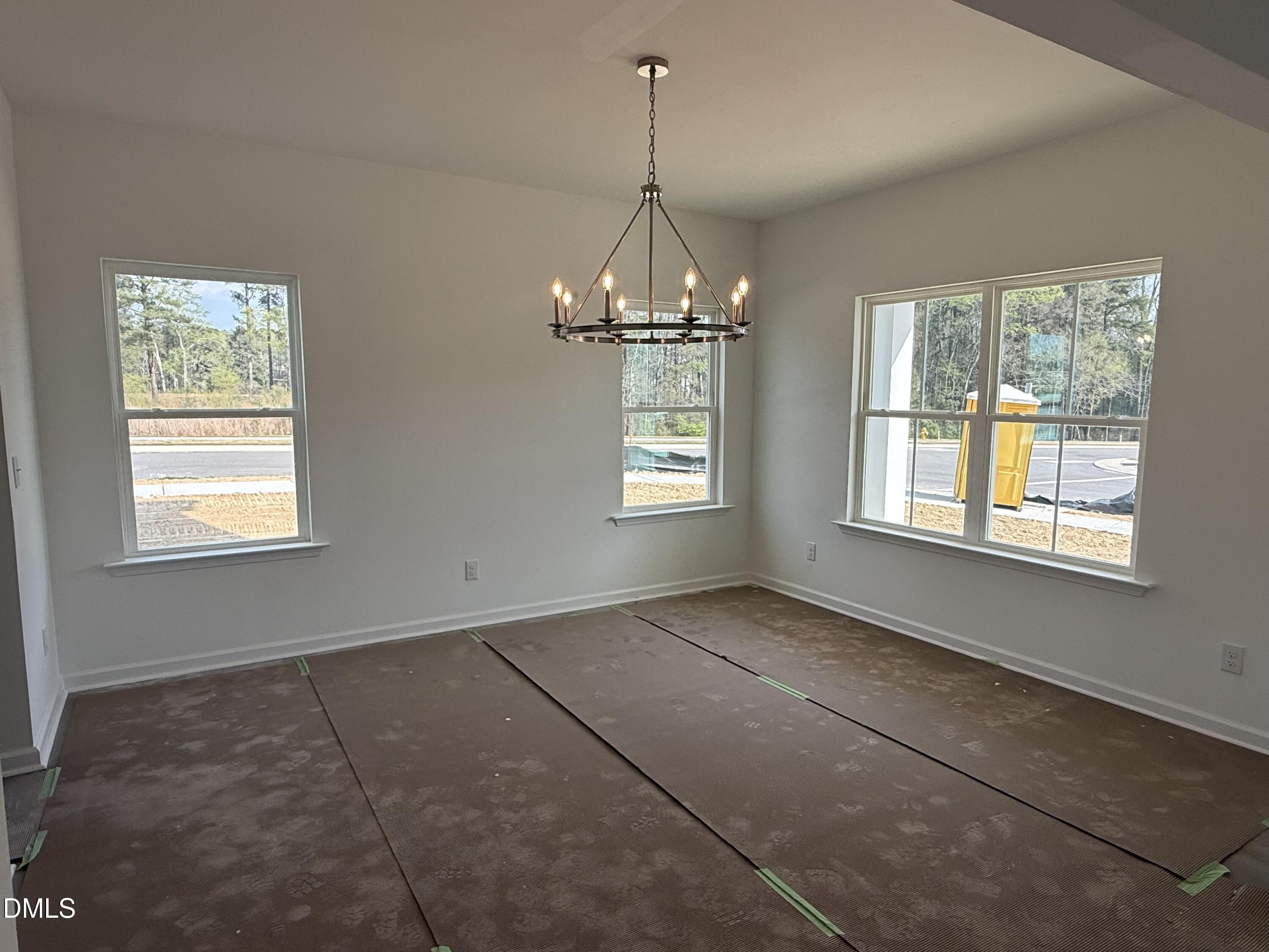 721 Compeer Way, Unit 35 Rolesville, NC 27571 - Photo 3 of 37 a view of an empty room with a window
