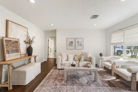 a living room with furniture and a couch