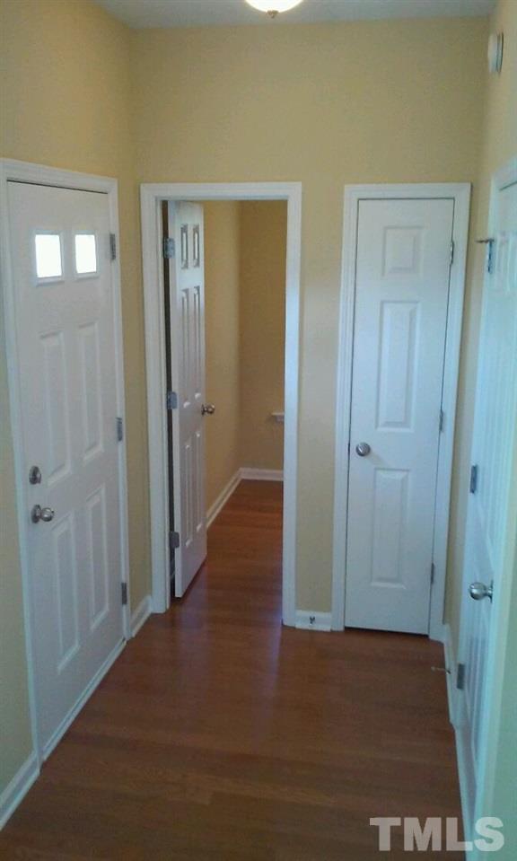 2132 Persimmon Ridge Drive Raleigh, NC 27604 - Photo 3 of 25 Entry foyer with half bath to the left as you enter, Living room to the right! Shows like brand new!