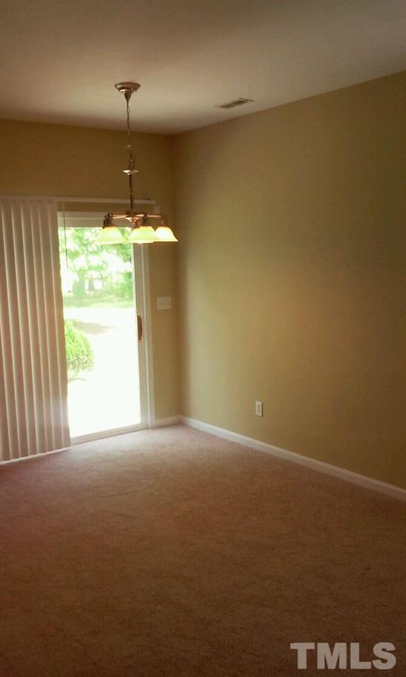 2132 Persimmon Ridge Drive Raleigh, NC 27604 - Photo 8 of 25 Dining area overlooks the patio and golf course view!