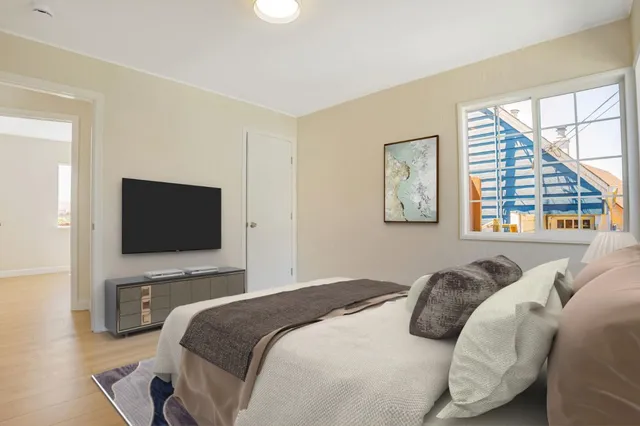 a bathroom with a sink mirror and toilet