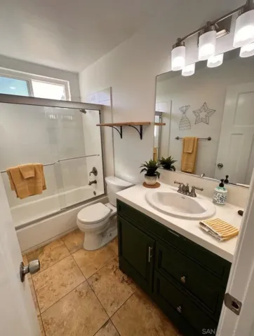 a view of a lake with a yard