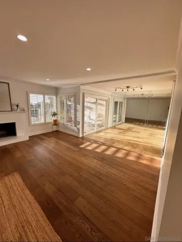 a kitchen with stainless steel appliances granite countertop a sink and a stove