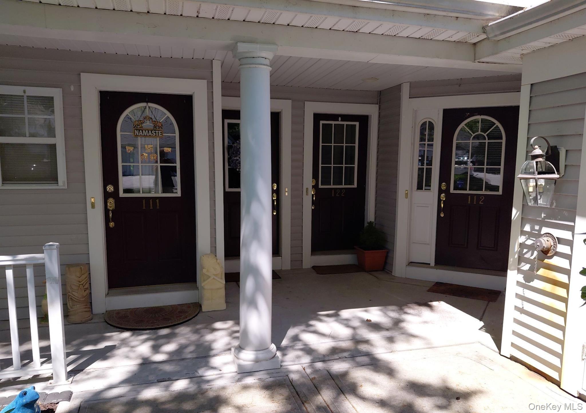 112 Riverbend Drive, Unit 88 Peekskill, NY 10566 - Photo 3 of 4 a view of a entryway door of the house