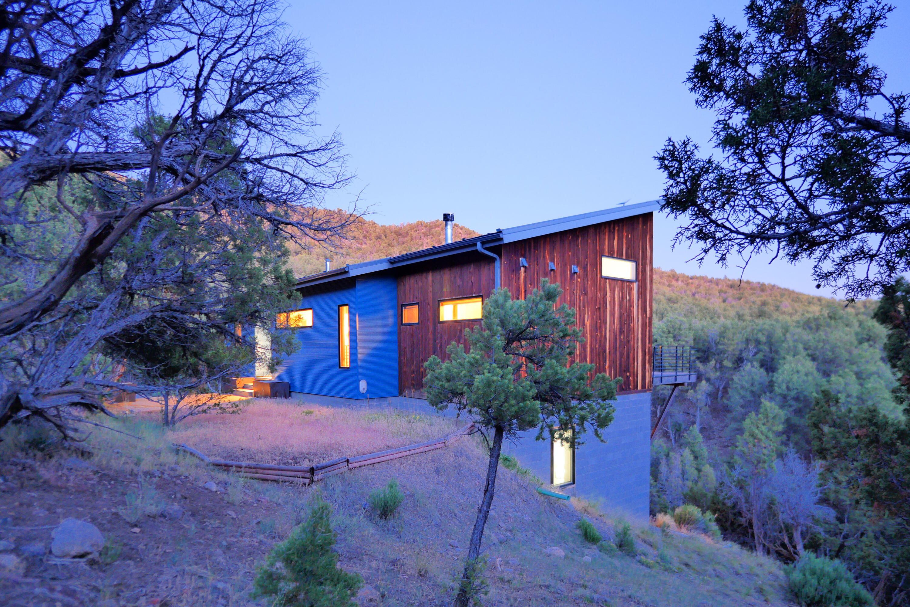 456 Ridge Road Montrose, CO 81403 - Photo 3 of 23 Evening glow among the pinons