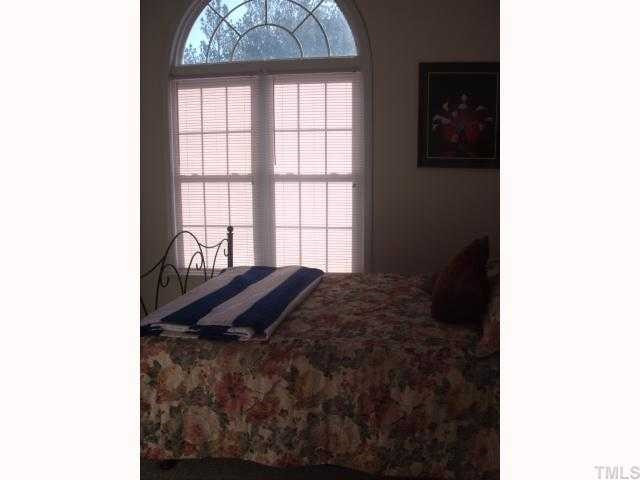 4201 Cheek Road Durham, NC 27704 - Photo 7 of 8 Beautiful Paladium window adorns a bedroom