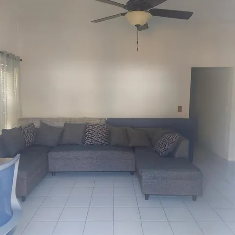 a living room with a couch and a coffee table