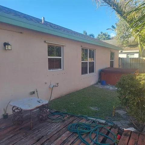 a view of backyard of house