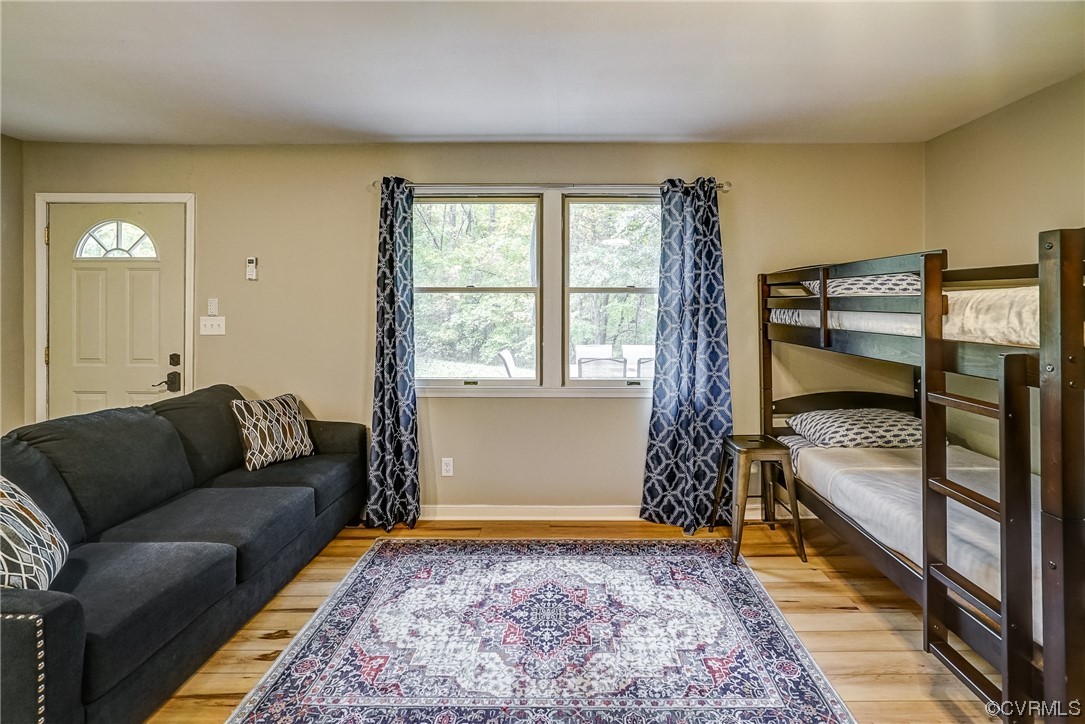 123 Plum Tree Circle Bumpass, VA 23024 - Photo 15 of 28 a living room with furniture and a rug