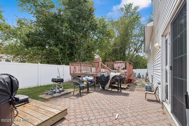 a view of storage and utility room with washer and dryer