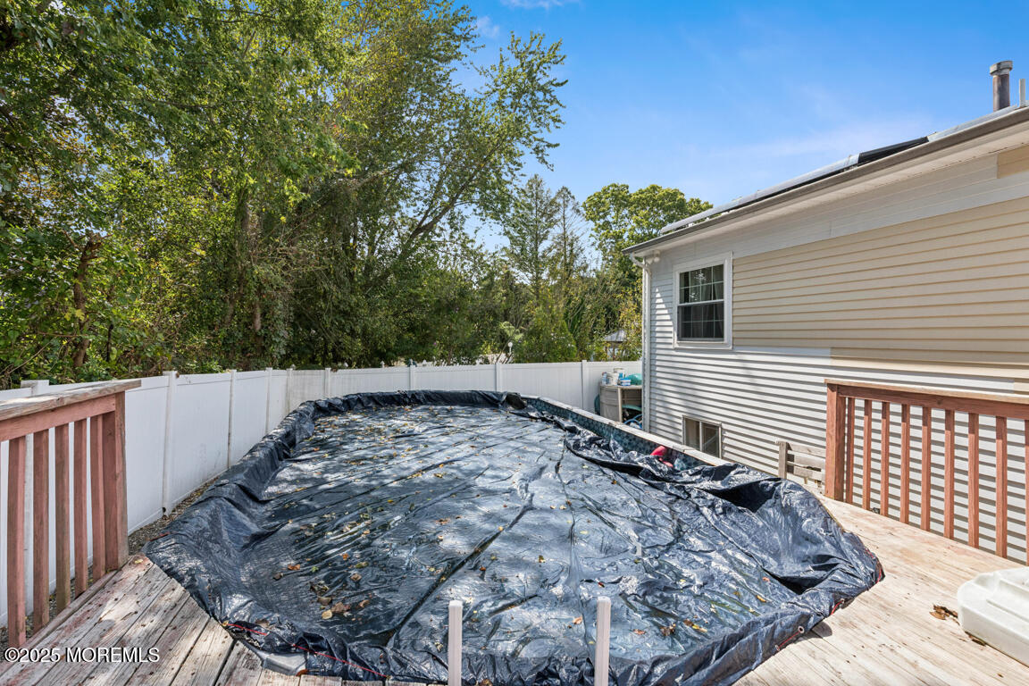 9 Cove Court Howell, NJ 07731 - Photo 18 of 20 a view of a backyard