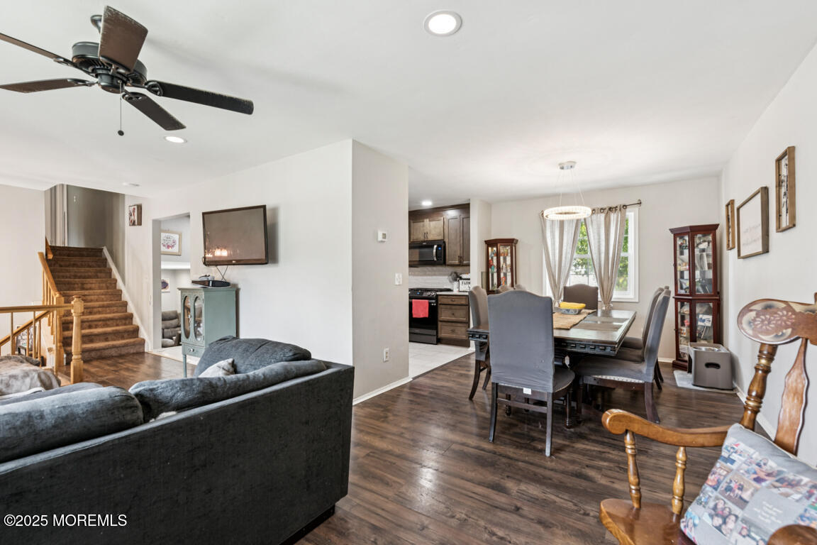 9 Cove Court Howell, NJ 07731 - Photo 6 of 20 a living room with furniture and a flat screen tv