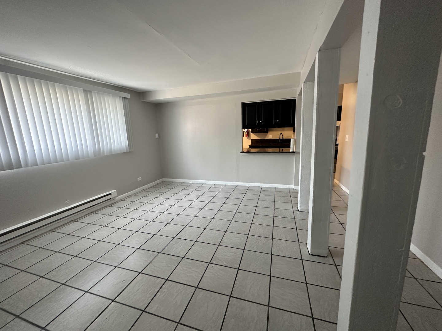 1751 Felten Road, Unit 1 Aurora, IL 60505 - Photo 7 of 12 a view of an empty room and window