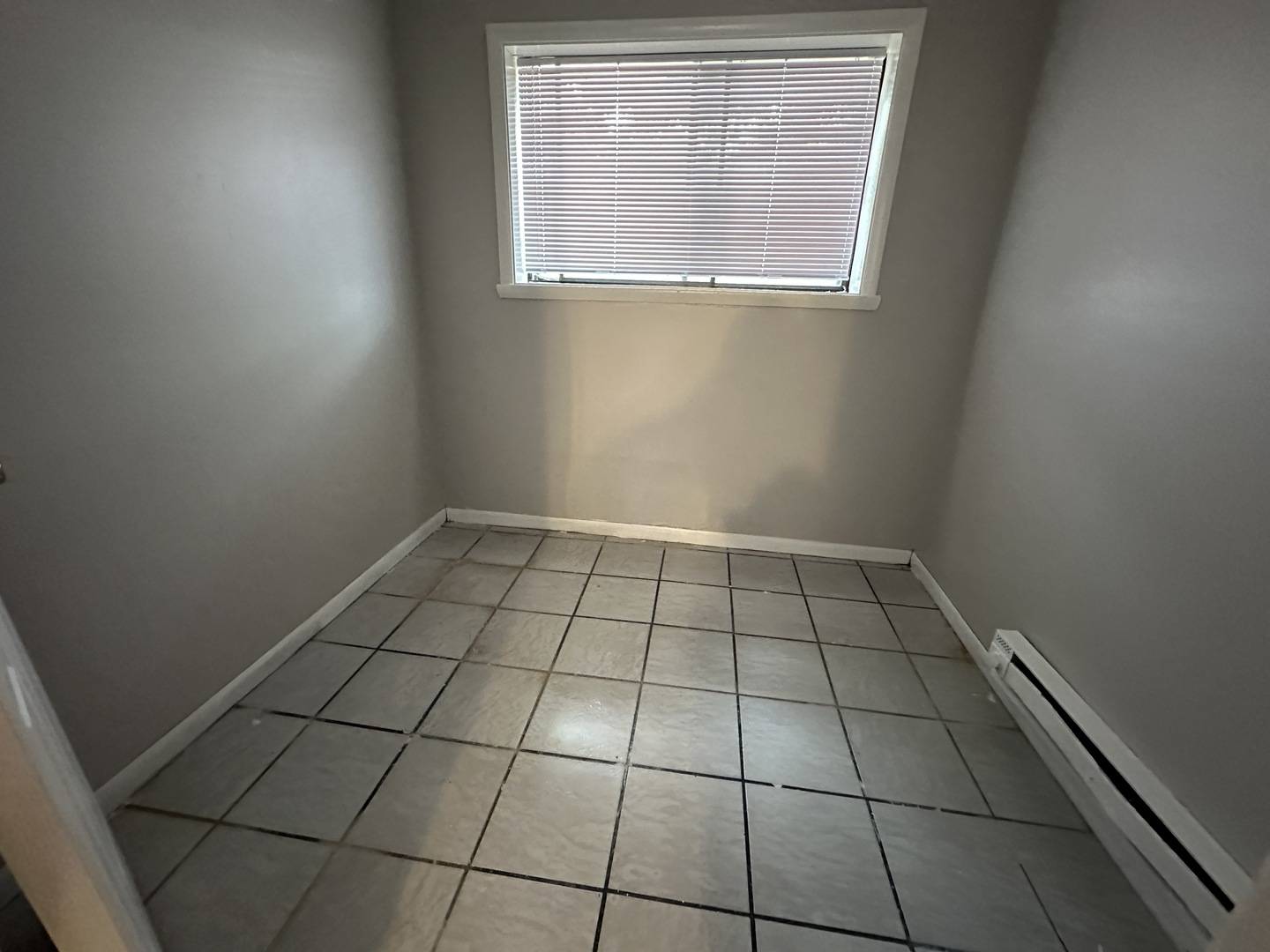 1751 Felten Road, Unit 1 Aurora, IL 60505 - Photo 10 of 12 a view of an empty room and window
