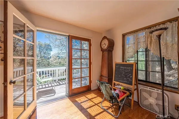 a view of an empty room with windows