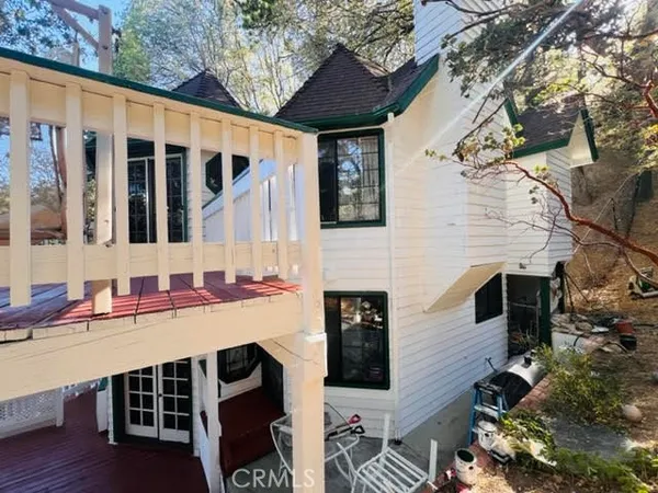 a front view of a house with a garage