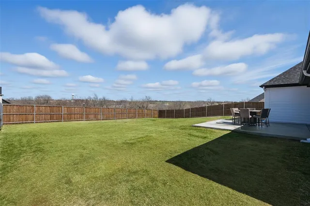 swimming pool view with a lake view