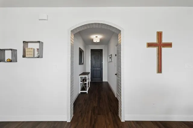 a view of a livingroom with wooden floor