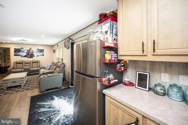 a kitchen with furniture and a kitchen