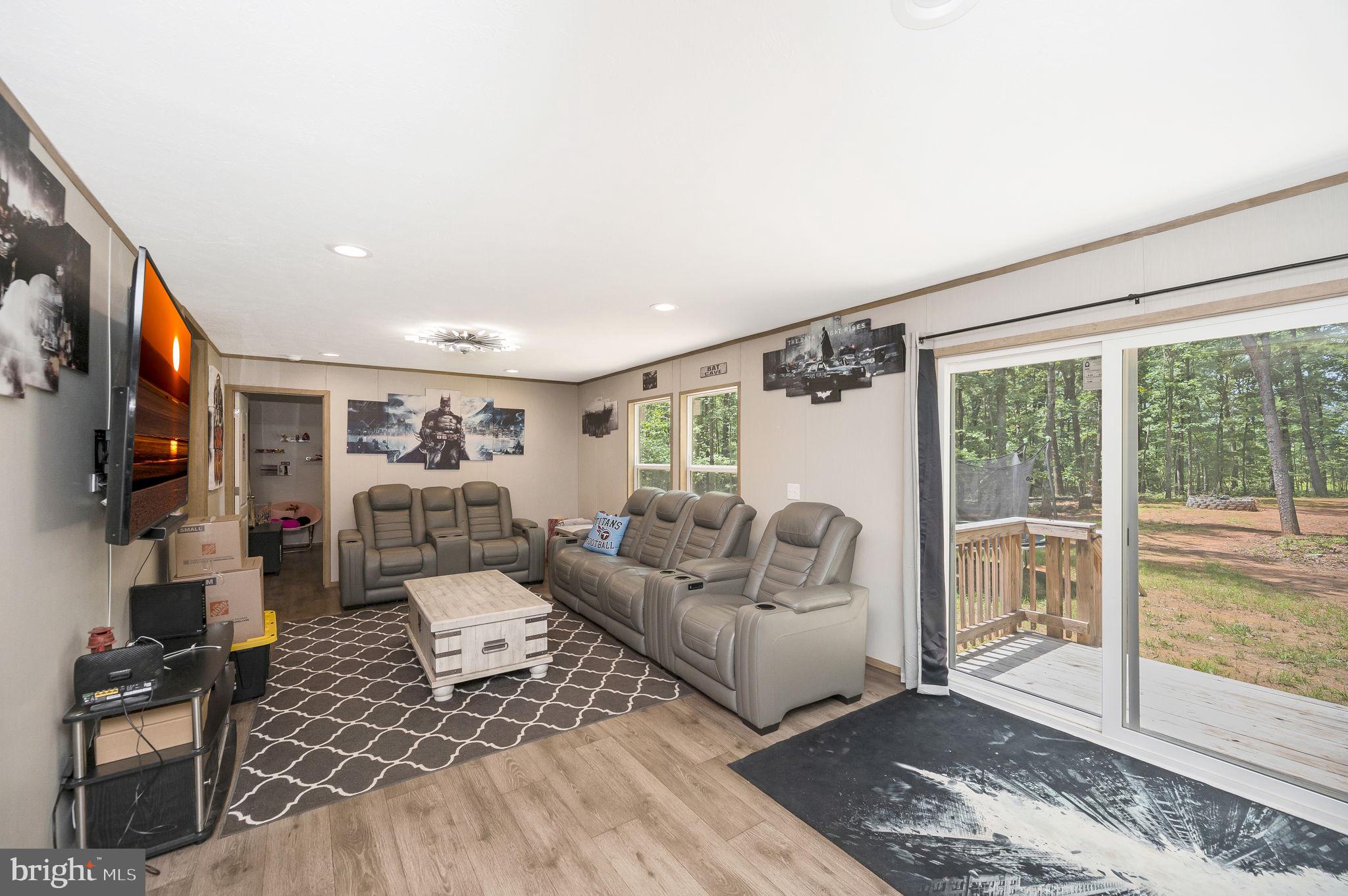 23066 Independence Road Unionville, VA 22567 - Photo 18 of 39 a living room with furniture and a large window