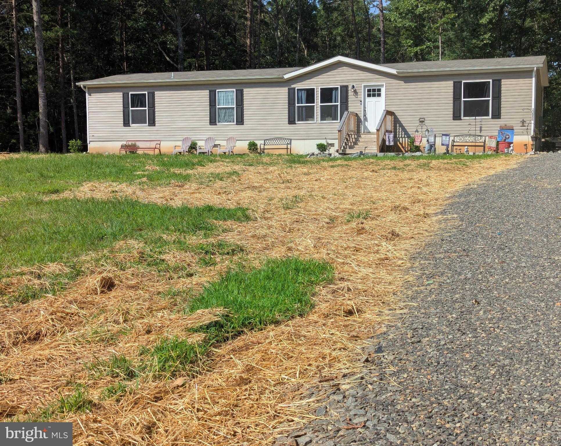 23066 Independence Road Unionville, VA 22567 - Photo 2 of 39 a front view of a house with a yard