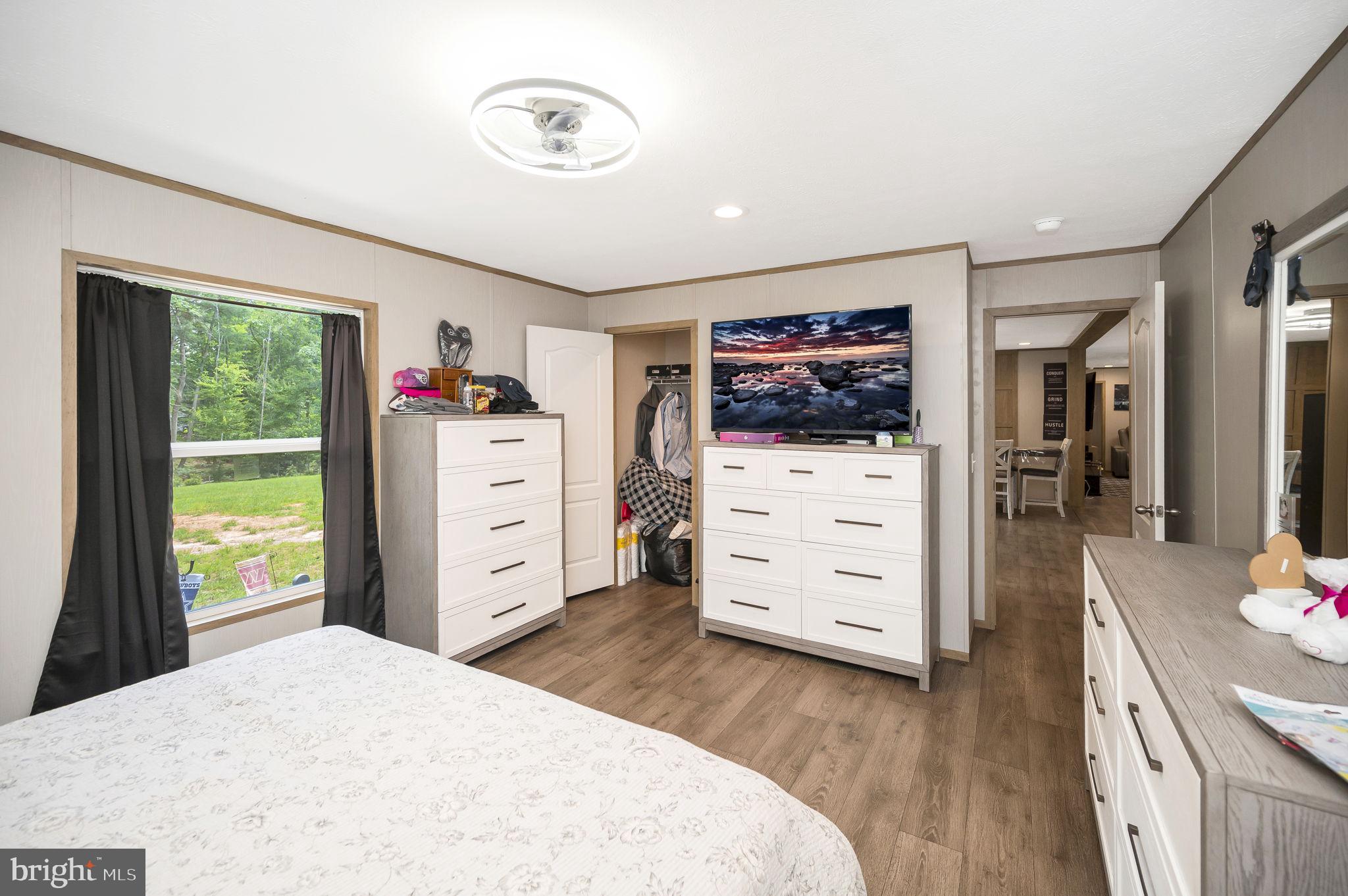23066 Independence Road Unionville, VA 22567 - Photo 22 of 39 a bedroom with a bed and furniture