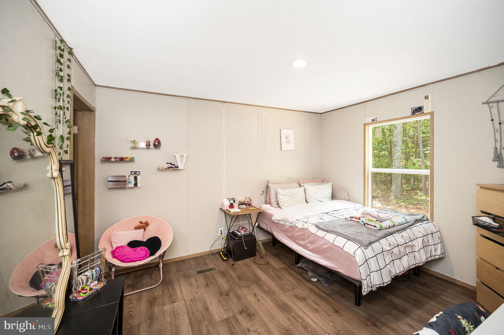 23066 Independence Road Unionville, VA 22567 - Photo 25 of 39 a bedroom with a bed and a window