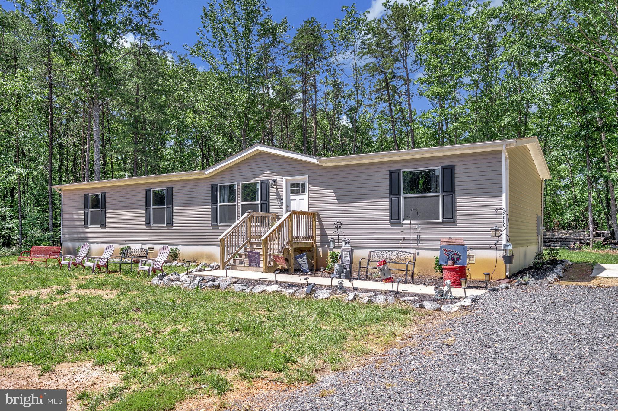 23066 Independence Road Unionville, VA 22567 - Photo 5 of 39 a view of a house with a yard