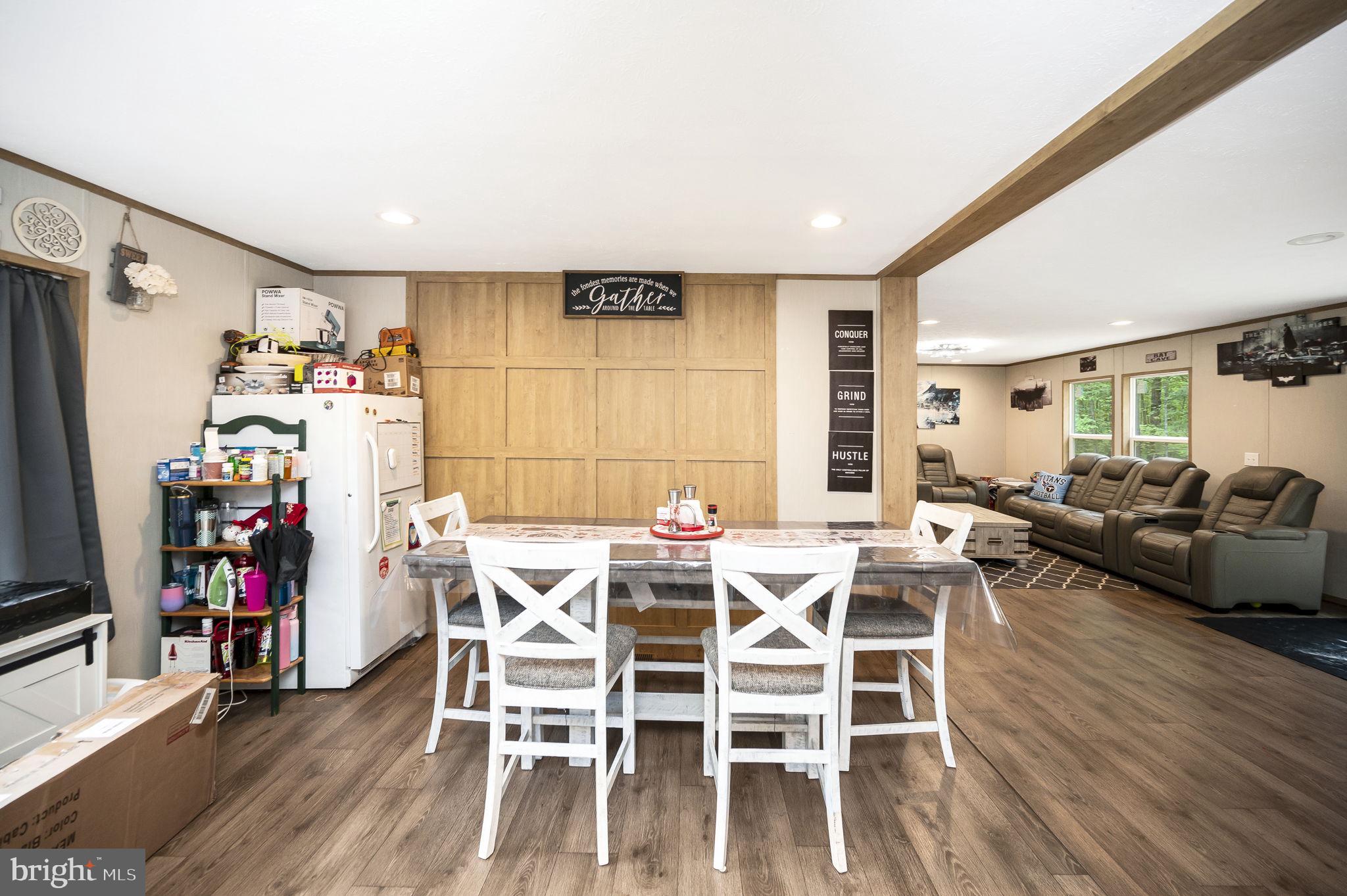 23066 Independence Road Unionville, VA 22567 - Photo 6 of 39 a view of a dining room with furniture and wooden floor