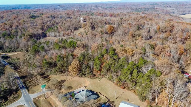 an aerial view of residential house with parking space