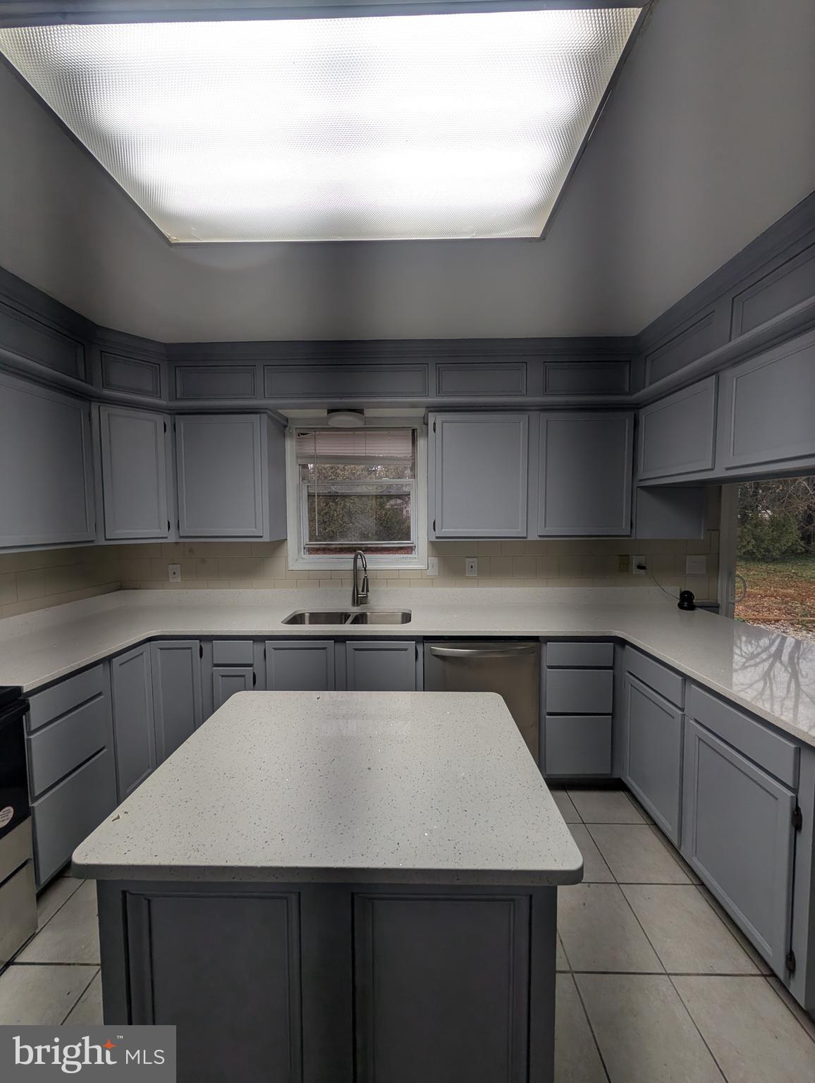2 Hawkesbury Court Newark, DE 19702 - Photo 12 of 57 a kitchen with a sink and cabinets