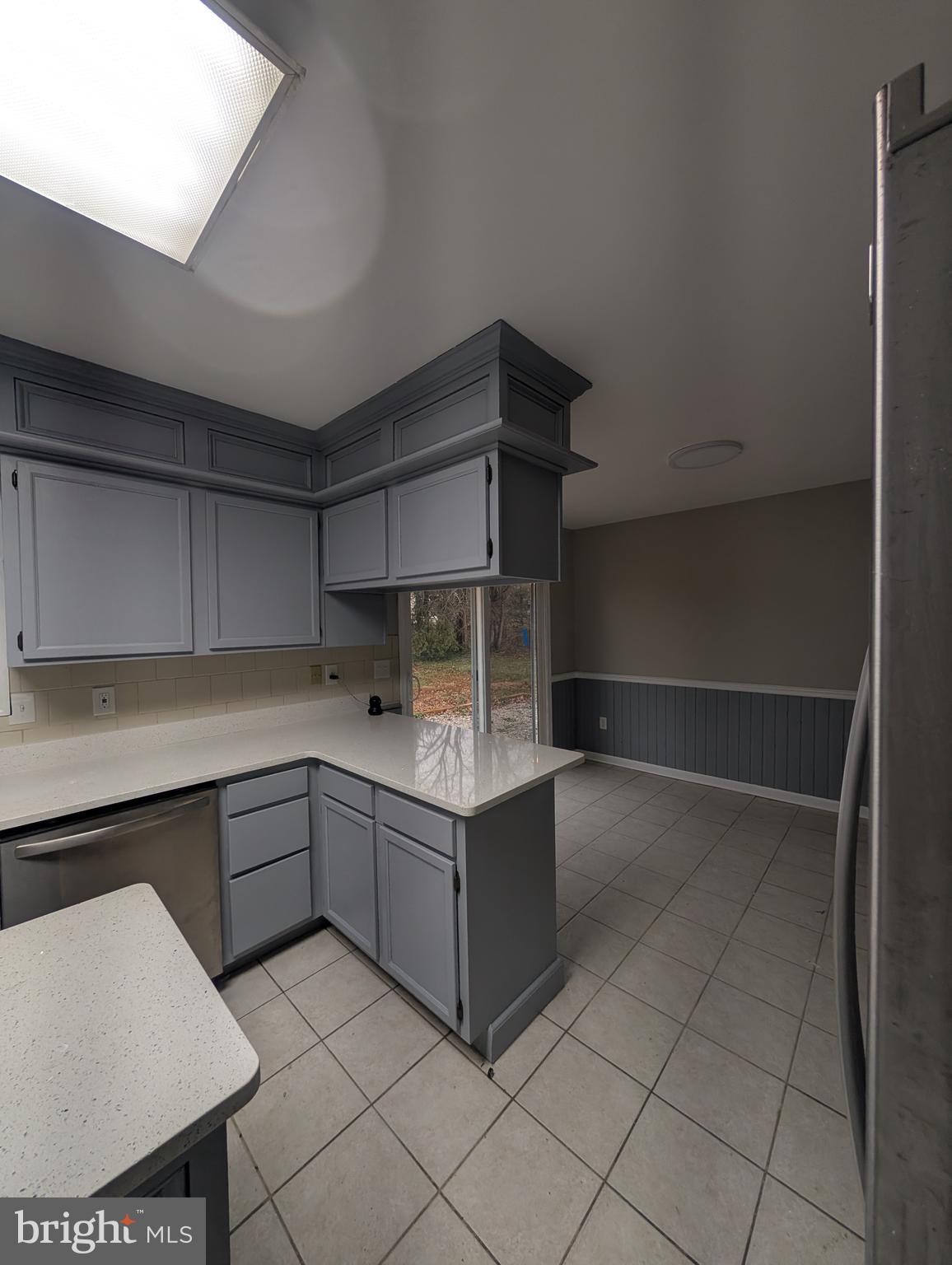 2 Hawkesbury Court Newark, DE 19702 - Photo 13 of 57 a kitchen with a cabinets and white appliances