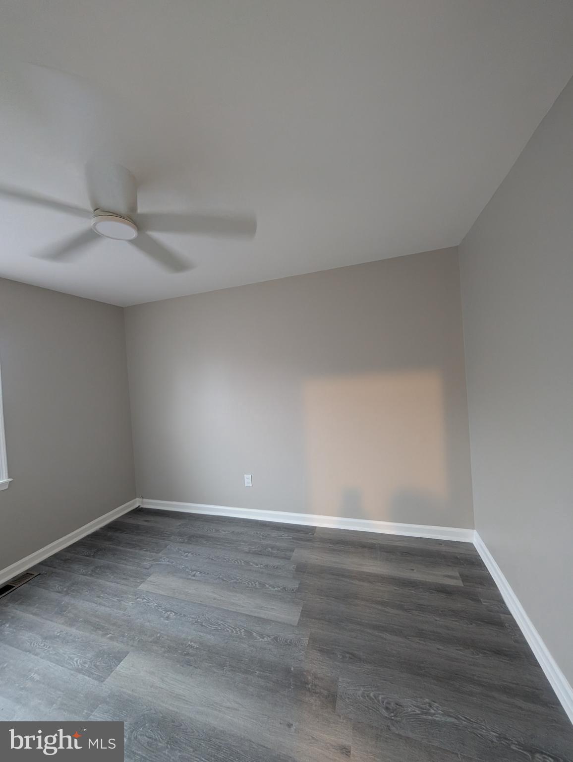 2 Hawkesbury Court Newark, DE 19702 - Photo 23 of 57 a view of an empty room and wooden floor