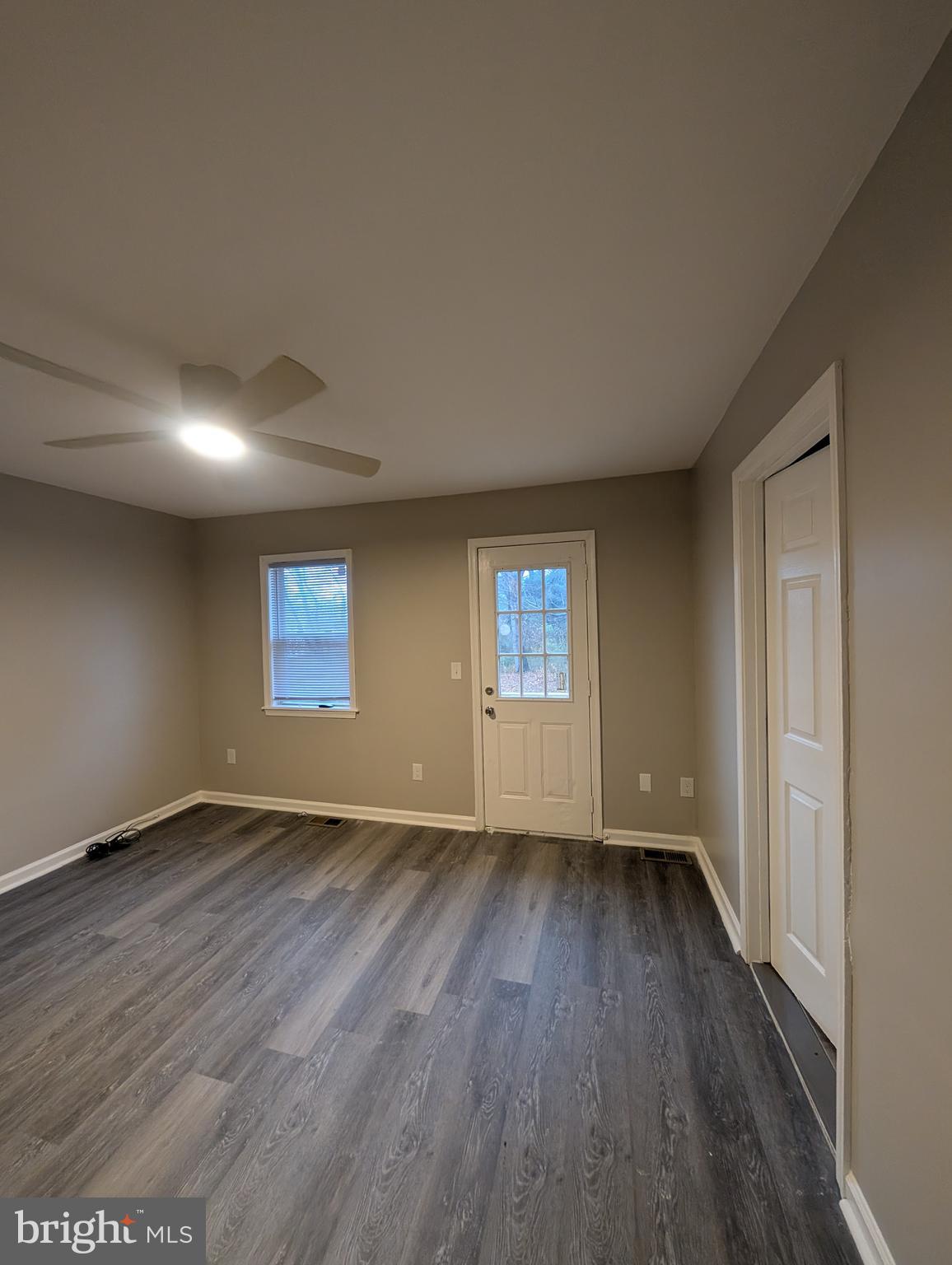 2 Hawkesbury Court Newark, DE 19702 - Photo 25 of 57 an empty room with wooden floor and windows