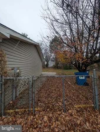 a view of a backyard of the house