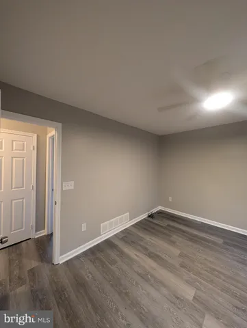 a bathroom with a sink a toilet and bathtub