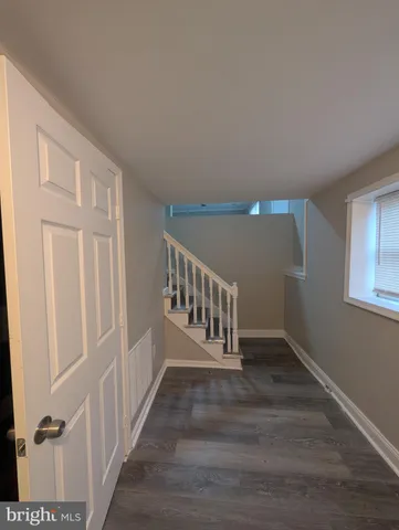 a view of wooden floor in an empty room