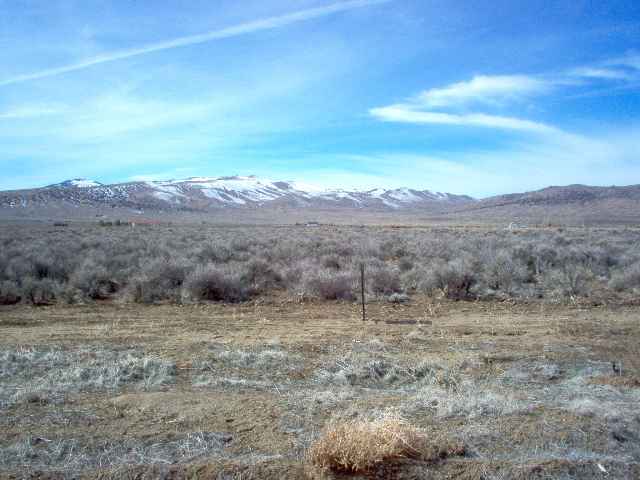 a view of an outdoor space with mountain view