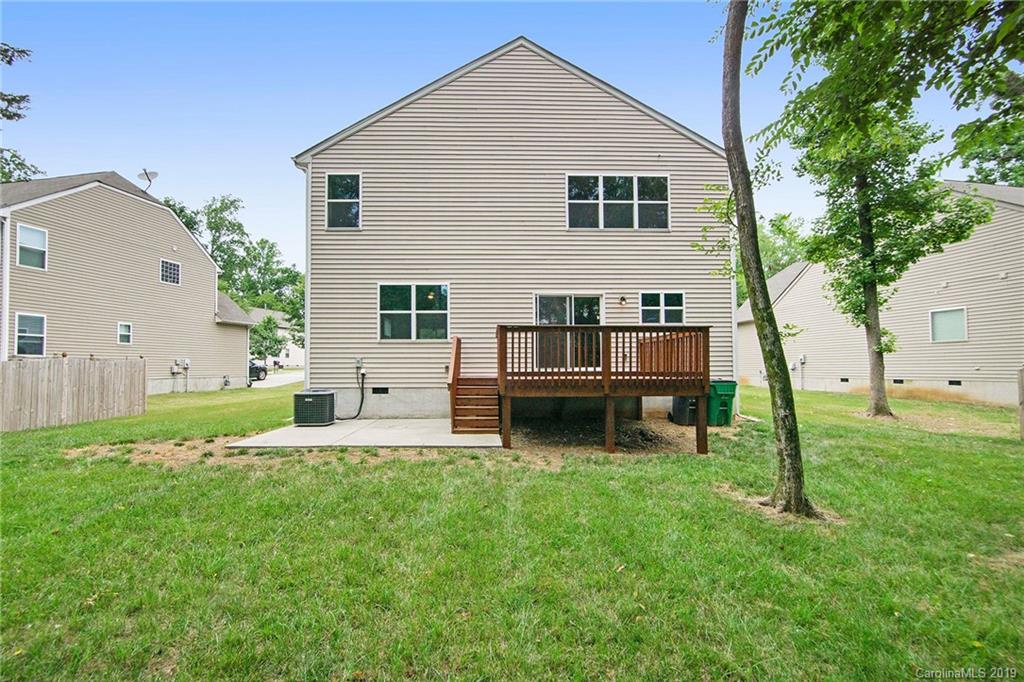 10244 Withers Road Charlotte, NC 28278 - Photo 2 of 17 a house that is sitting in the grass