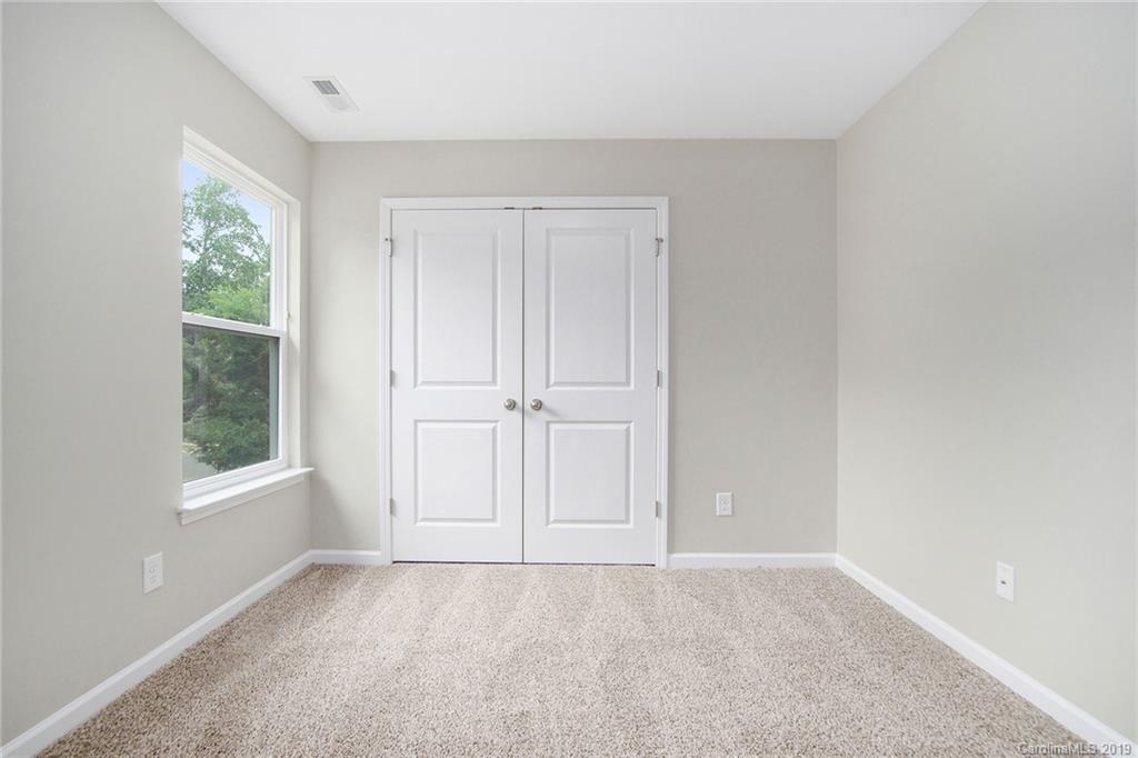 10244 Withers Road Charlotte, NC 28278 - Photo 12 of 17 an empty room with windows