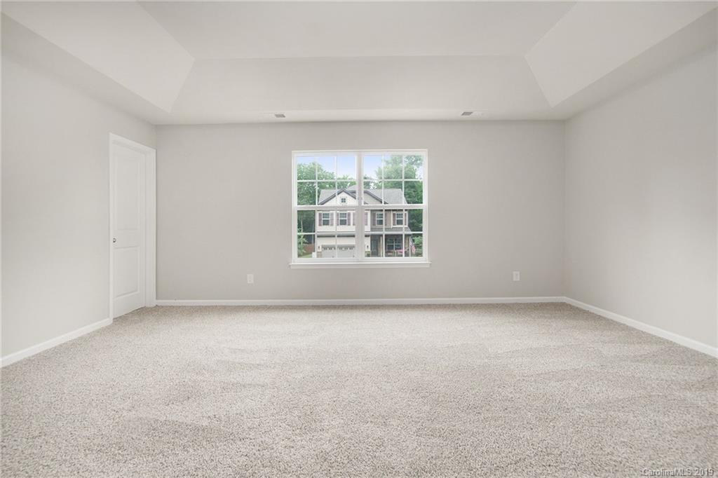 10244 Withers Road Charlotte, NC 28278 - Photo 14 of 17 an empty room with windows