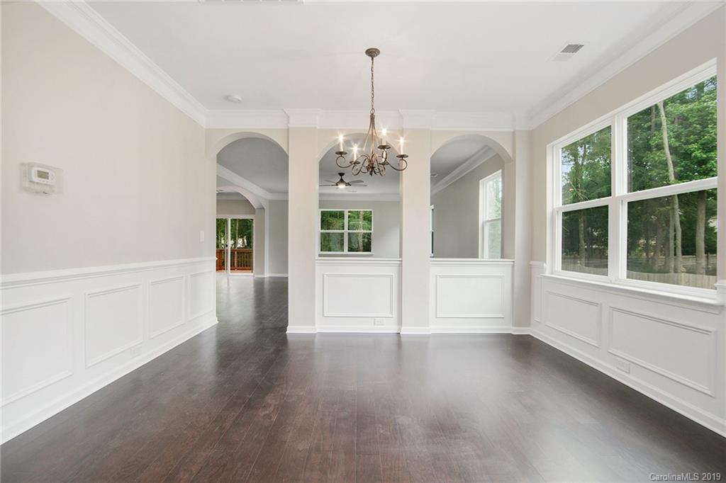 10244 Withers Road Charlotte, NC 28278 - Photo 4 of 17 a view of a room with windows and chandelier