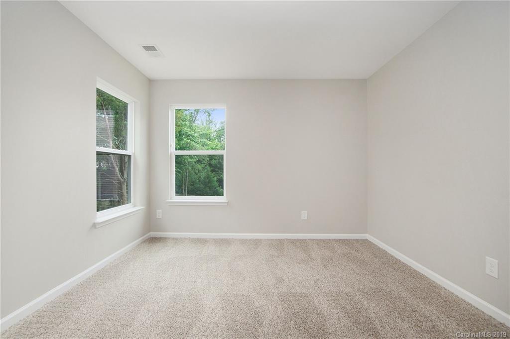 10244 Withers Road Charlotte, NC 28278 - Photo 10 of 17 an empty room with a window