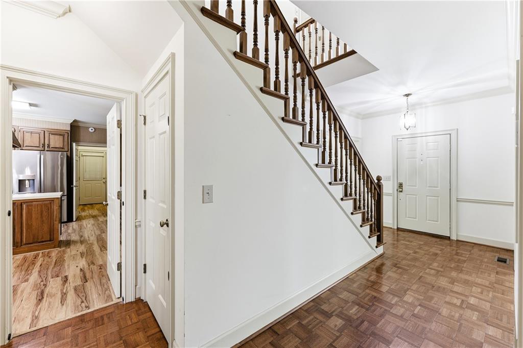 3608 Maple Forge Lane Gainesville, GA 30504 - Photo 5 of 45 a view of a hallway with wooden floor and entryway