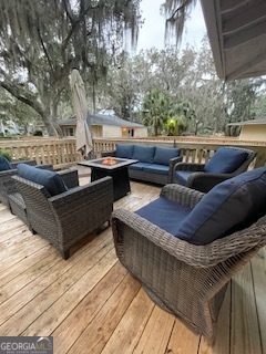 620 Executive Golf Villas Road St. Simons, GA 31522 - Photo 18 of 23 a outdoor living space with furniture