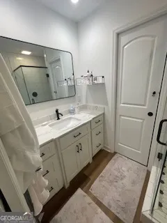 a spacious bathroom with a double vanity sink mirror and